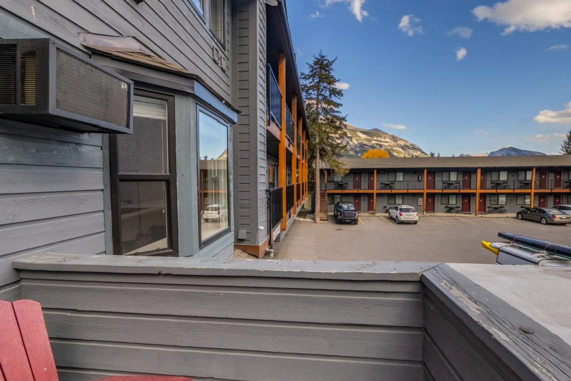 The apartment's balcony looking over the courtyard to the mountains